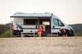 Campervan or motorhome parked on the beach in Greece